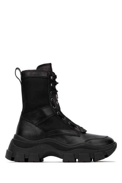 prada boot outfit|Prada chunky sole combat boots.